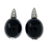 A pair of 18ct gold diamond and onyx earrings.Estimated total diamond weight 0.25cts.Hallmarks for