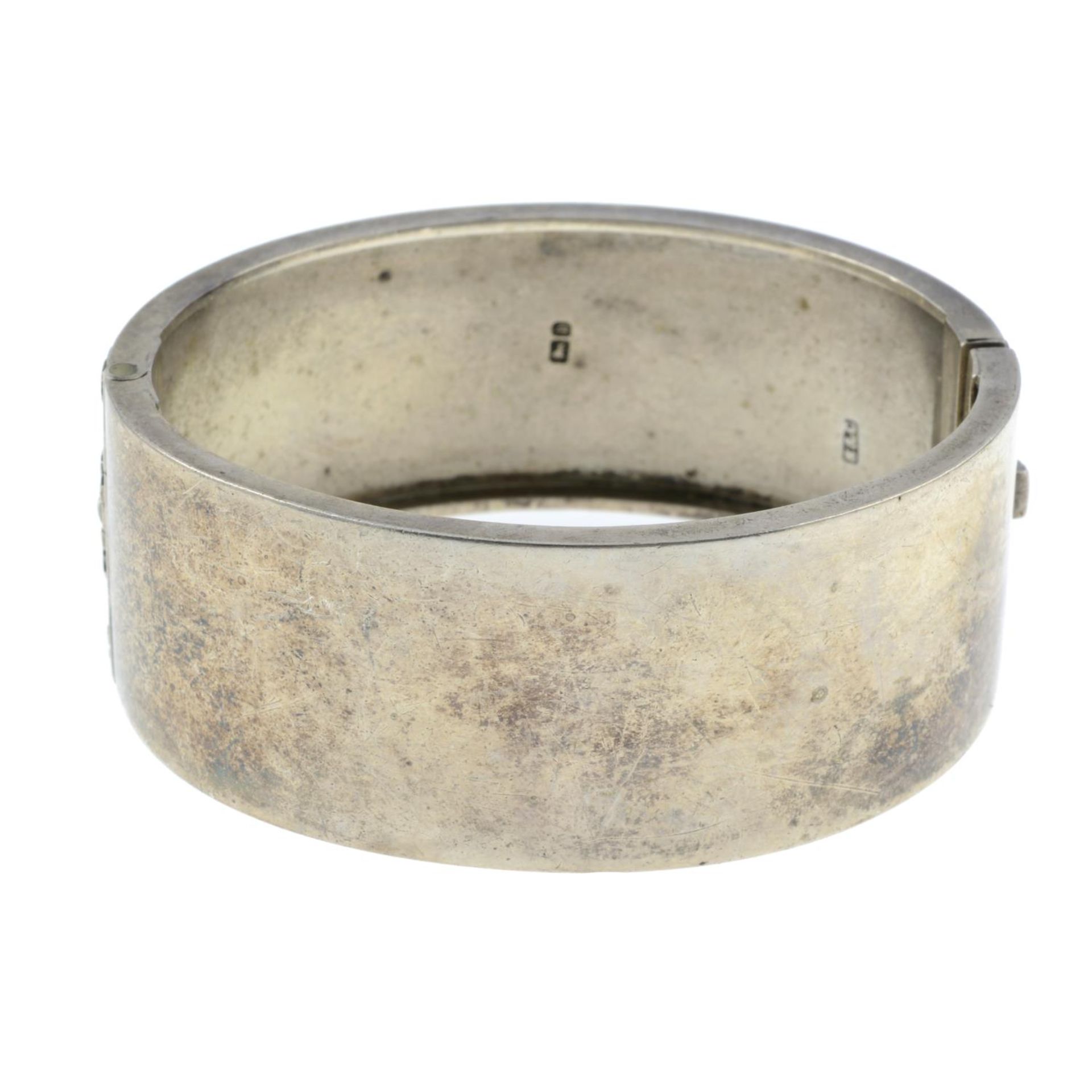 A Victorian silver bangle.Hallmarks for Birmingham, 1882.Inner diameter 5.5cms. - Image 2 of 2