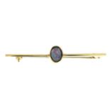 An opal triplet bar brooch.Length 5cms.