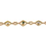 A diamond and emerald bracelet.Estimated total diamond total weight 0.14cts.Length 20cms.