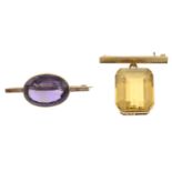 An amethyst brooch and a citrine brooch.Lengths 2.5 and 3.2cms.