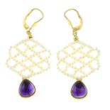 A pair of seed pearl and amethyst drop earrings.Stamped 750.Length 5.3cms.