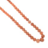 A graduated coral single-strand necklace.