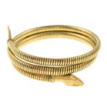 A mid 20th century rolled gold engraved snake bangle.Stamped rolled gold.
