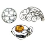 Two gem-set brooches along with further open work brooches.Four with marks to indicate silver.