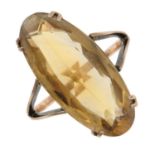 A smoky quartz oval-cut single stone ring.Ring size R.