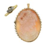 A diamond and white gem three-stone ring and a 9ct gold shell cameo pendant.Pendant may be worn as