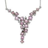 A 9ct gold pink tourmaline and diamond fancy necklace.Hallmarks for London.Length 43.1cms.