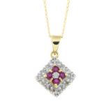 A ruby and diamond pendant, with chain.Both stamped 375.Length of pendant 2cms.