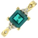 A synthetic emerald and diamond ring.Stamped 14K.