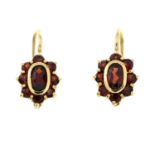 A pair of garnet cluster earrings.Stamped 585.Length 1.6cms.