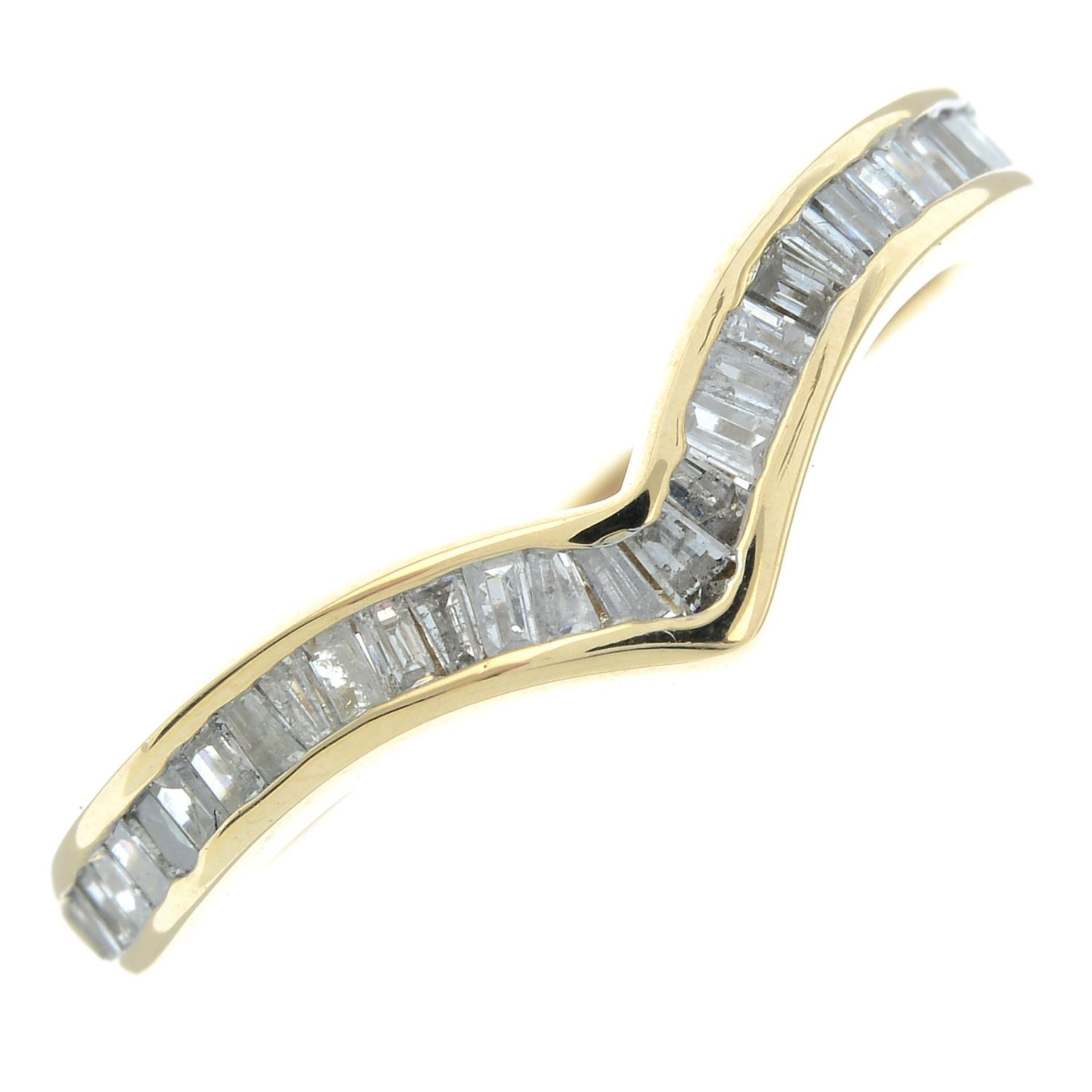 A 9ct gold baguette-cut diamond ring.Hallmarks for Sheffield.