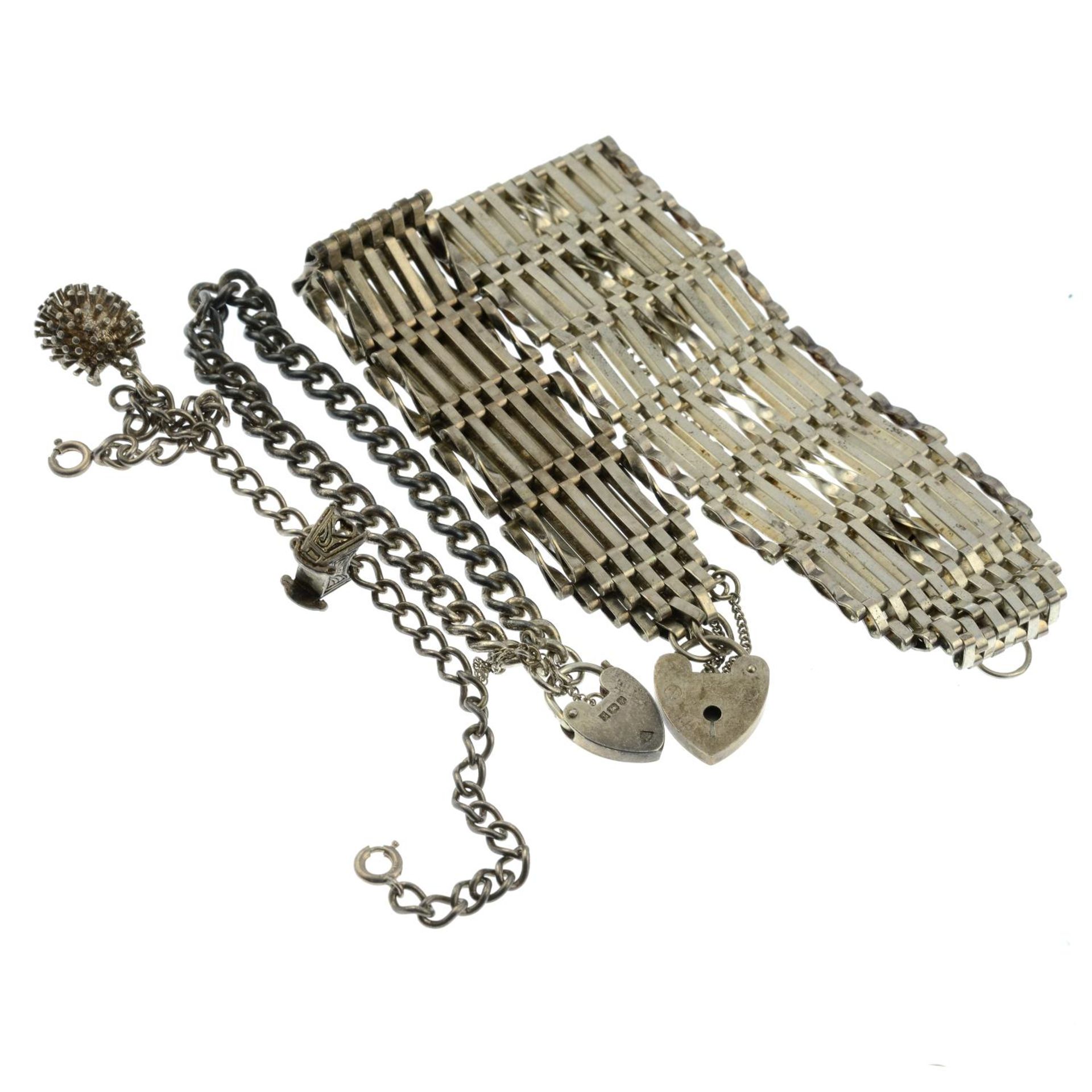 Two silver gate bracelets and three charm bracelets.Three with hallmarks for London and Birmingham. - Image 2 of 2