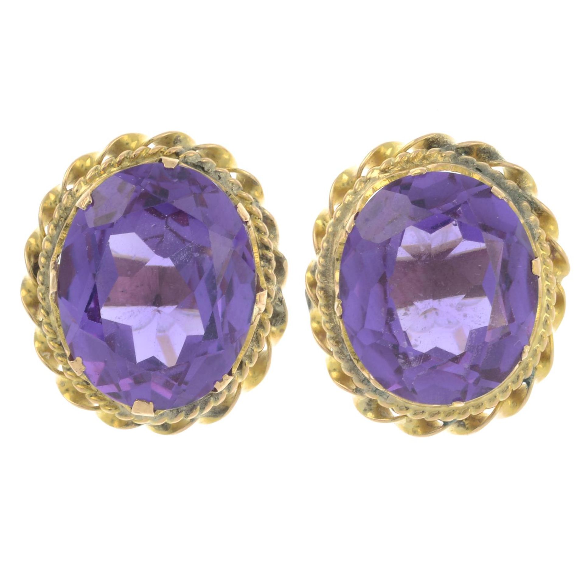 A pair of synthetic colour-change sapphire earrings.Marks to indicate gold, partially indistinct.