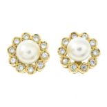 An 18ct gold cultured pearl and diamond stud earrings.Hallmarks partially indistinct.Length 1.2cms.