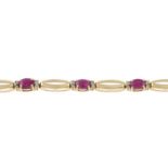A 9ct gold ruby and diamond bracelet.Total diamond weight stamped to bracelet 0.25cts.Hallmarks
