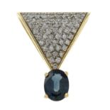 A diamond and sapphire pendant.Stamped 14k.Length 2.5cms.