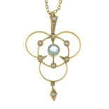 An Edwardian aquamarine and split pearl pendant, with chain.Length of pendant 4.1cms.