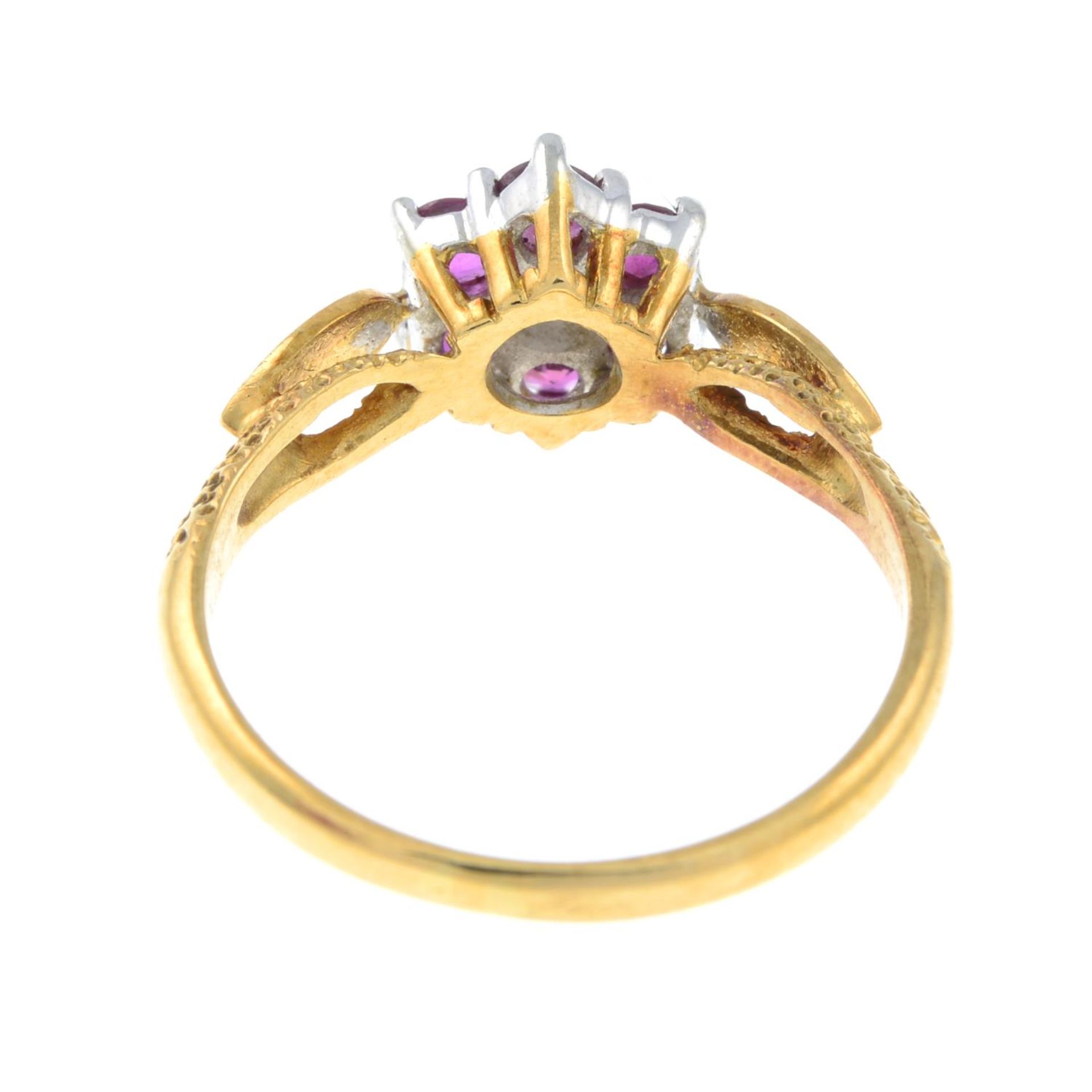 An 18ct gold ruby and diamond cluster ring. - Image 3 of 3
