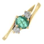 9ct gold emerald and diamond three-stone ring.Total diamond weight 0.10ct,