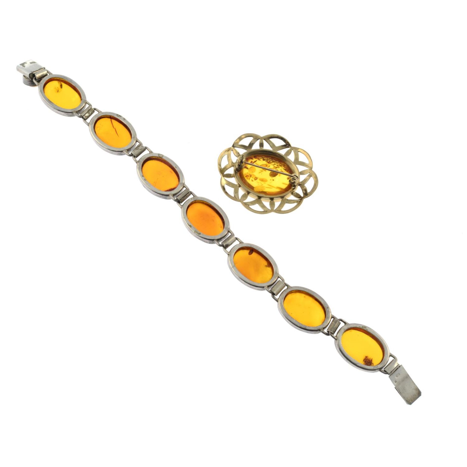 A modified amber brooch and bracelet.Bracelet stamped 925.Length of brooch 4cms. - Image 2 of 2