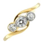 A mid 20th century 18ct gold old-cut diamond three-stone ring.Estimated total diamond weight