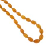 An amber and bakelite bead necklace.Amber is untested.Diameter of beads 1 to 1.3cms.