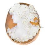 An early 20th century 9ct gold cameo brooch depicting a Bacchante.May be worn as a pendant.Stamped