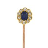 A sapphire and old-cut diamond cluster stick-pin.Estimated total diamond weight 0.20ct.Length of