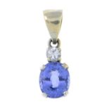 A sapphire and diamond pendant.Estimated diamond weight 0.1cts.Stamped 585.Length 1.8cms.