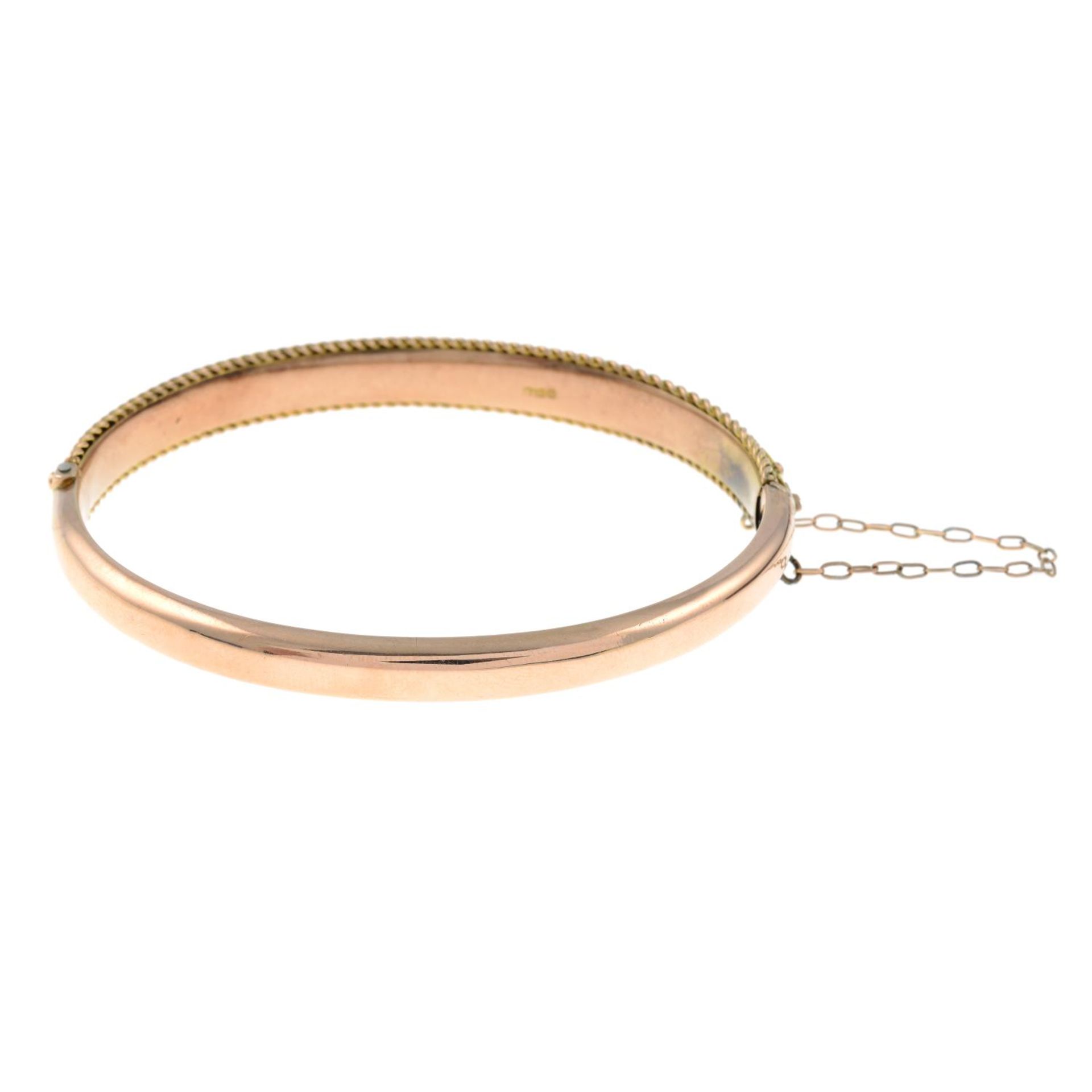 An Edwardian 9ct gold cannetille hinged bangle.Hallmarks for Chester, 1905.Inner diameter 6cms. - Image 2 of 2