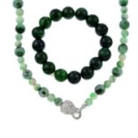 A dyed jade necklace with a cubic zirconia panther head clasp,