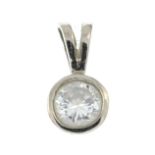 A diamond pendant.Estimated diamond weight 0.2cts.Length 1cms.