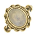 A 9ct gold moonstone ring with twisted wire surround.Hallmarks for London.Ring size P1/2.