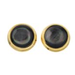 A pair of 9ct gold mother-of-pearl stud earrings.Hallmarks for Sheffield.Length 1.2cms.