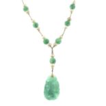 Two 1920's Egyptian revival glass necklaces and an imitation pearl and green glass necklace,