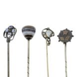 Eight Victorian and later stickpins,