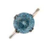 An early 20th century 9ct gold blue zircon single-stone ring.Stamped 9ct.Ring size K.