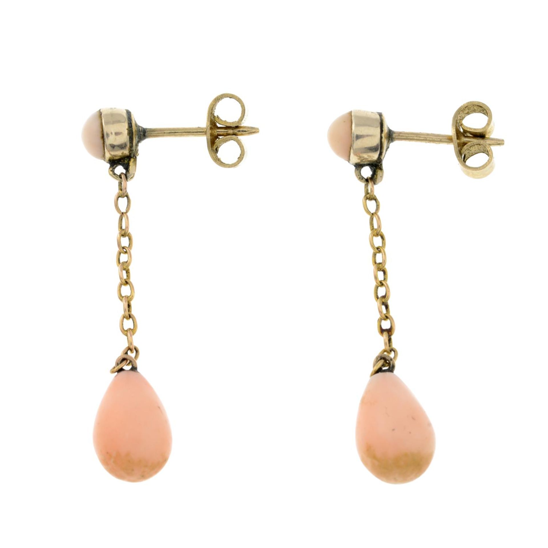 A pair of early 20th century coral drop earrings.Earring backs stamped 9ct.Length 3cms. - Image 2 of 2