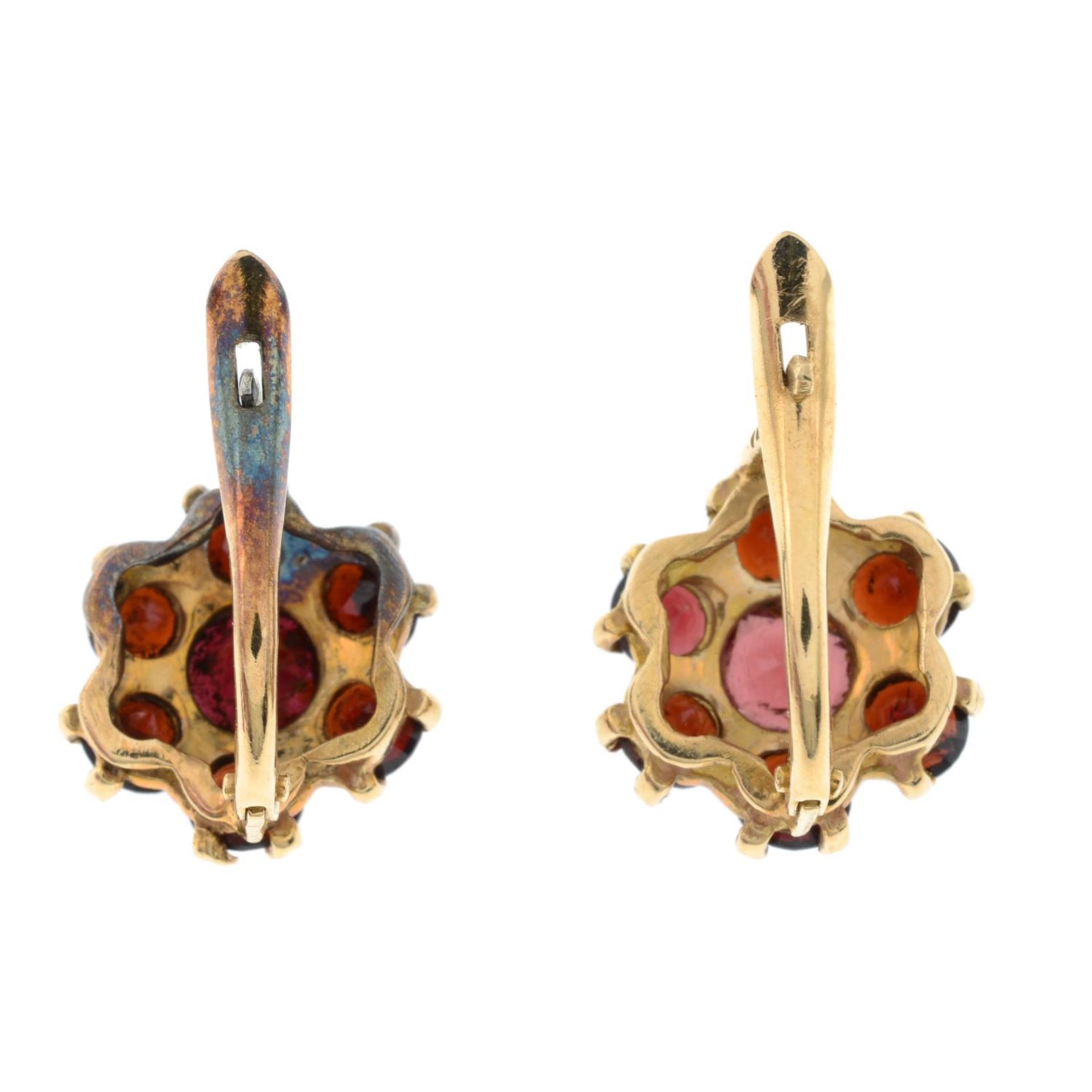 A pair of garnet floral cluster earrings. - Image 2 of 3