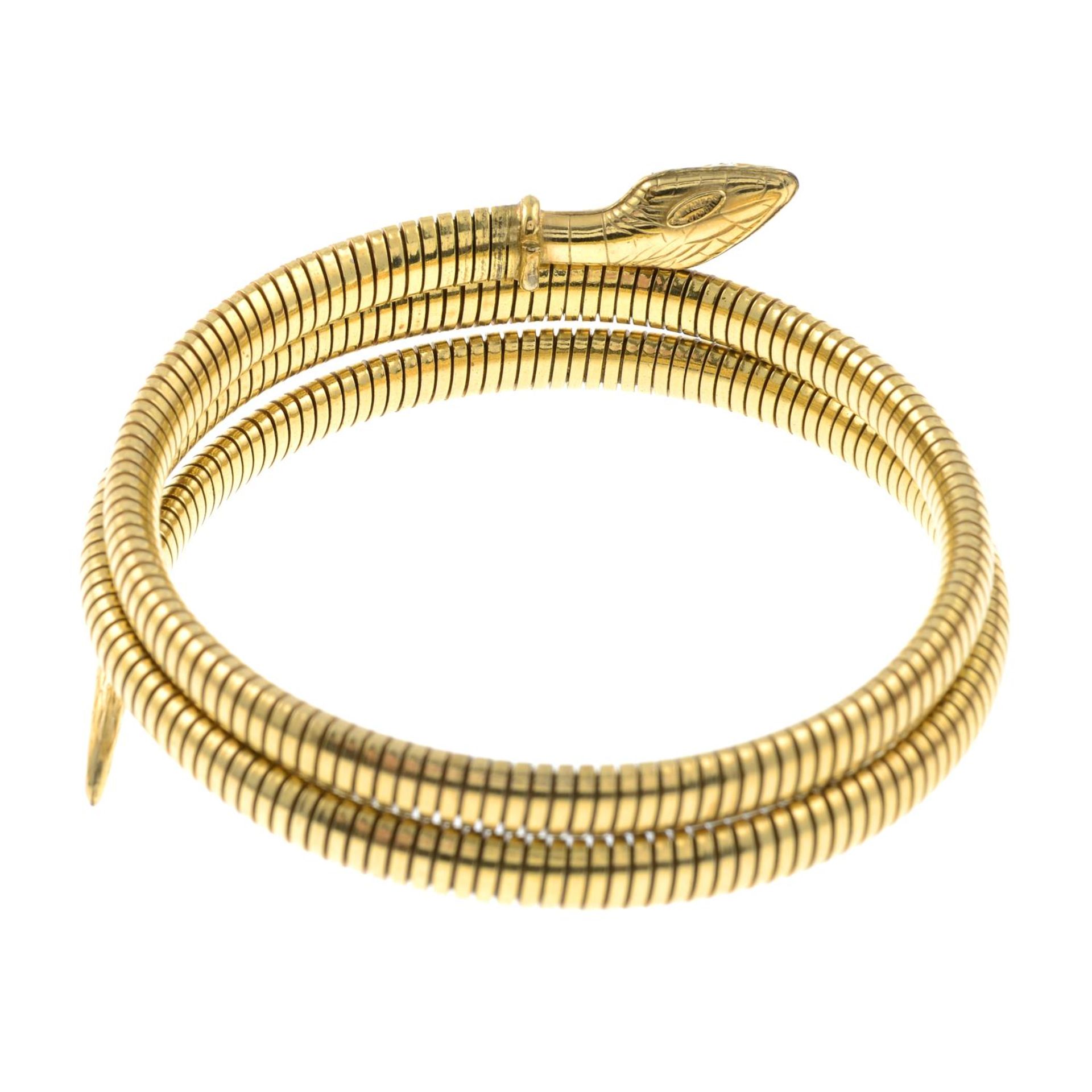 A mid 20th century rolled gold engraved snake bangle.Stamped rolled gold. - Image 2 of 2