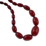 A red bakelite bead necklace and a loose beads.Diameter of beads 1.1 to 2.9cms.