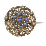 A 19th century paste and split pearl brooch.Length 2.3cms.