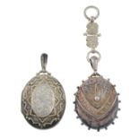 Two late Victorian silver engraved lockets.Hallmarks for Birmingham,