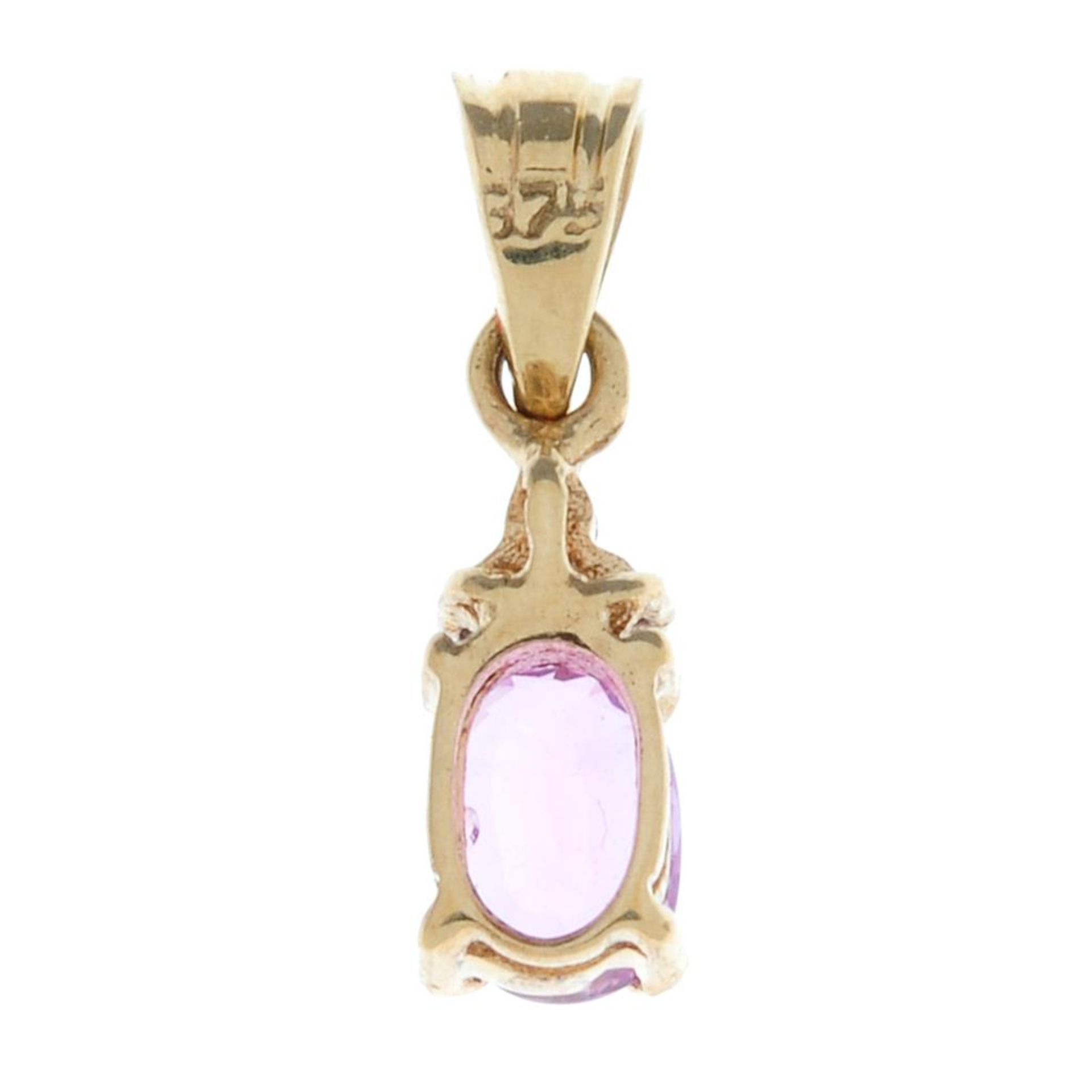 A pink sapphire and diamond pendant.Stamped 375.Length 1.5cms. - Image 2 of 2