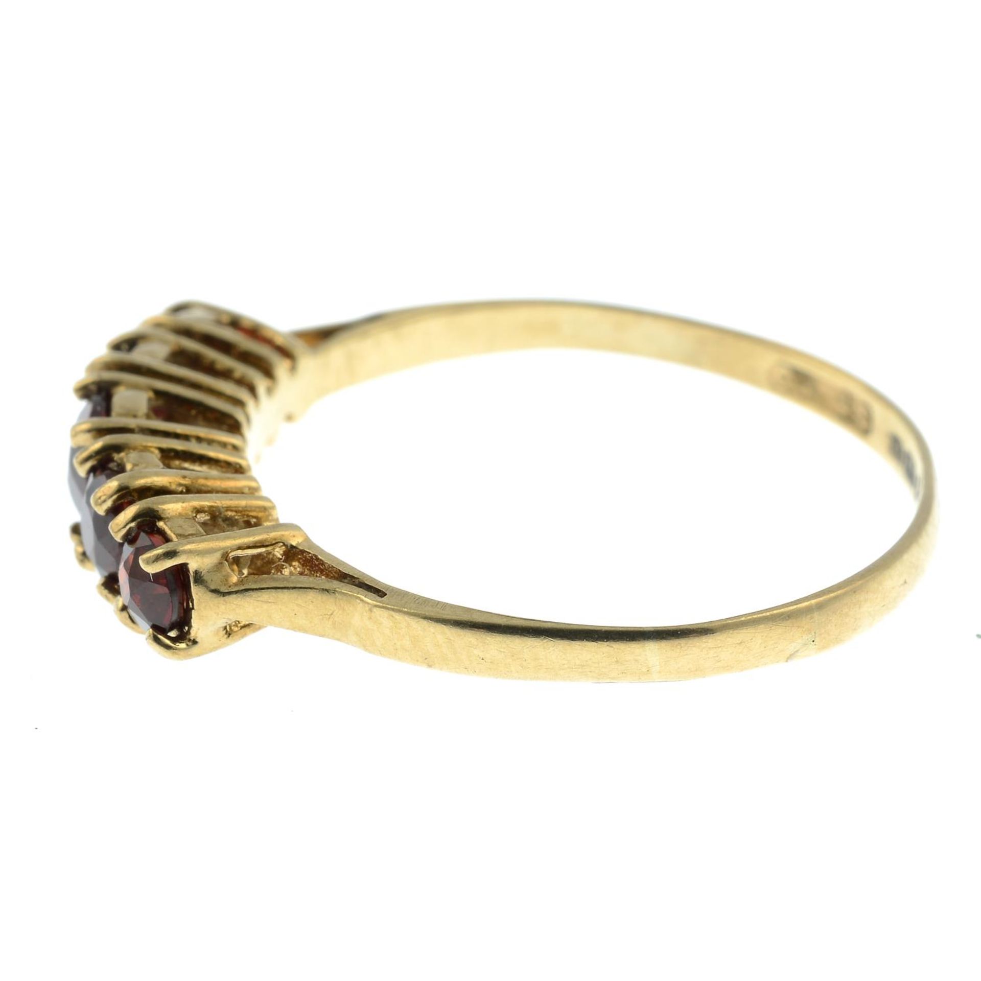 A 9ct gold garnet five-stone ring.Hallmarks for Edinburgh, 1981.Ring size S. - Image 2 of 3