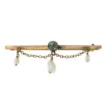 A 9ct gold moss agate bar brooch with suspended seed pearls.Stamped 9ct.Length 4.4gms.