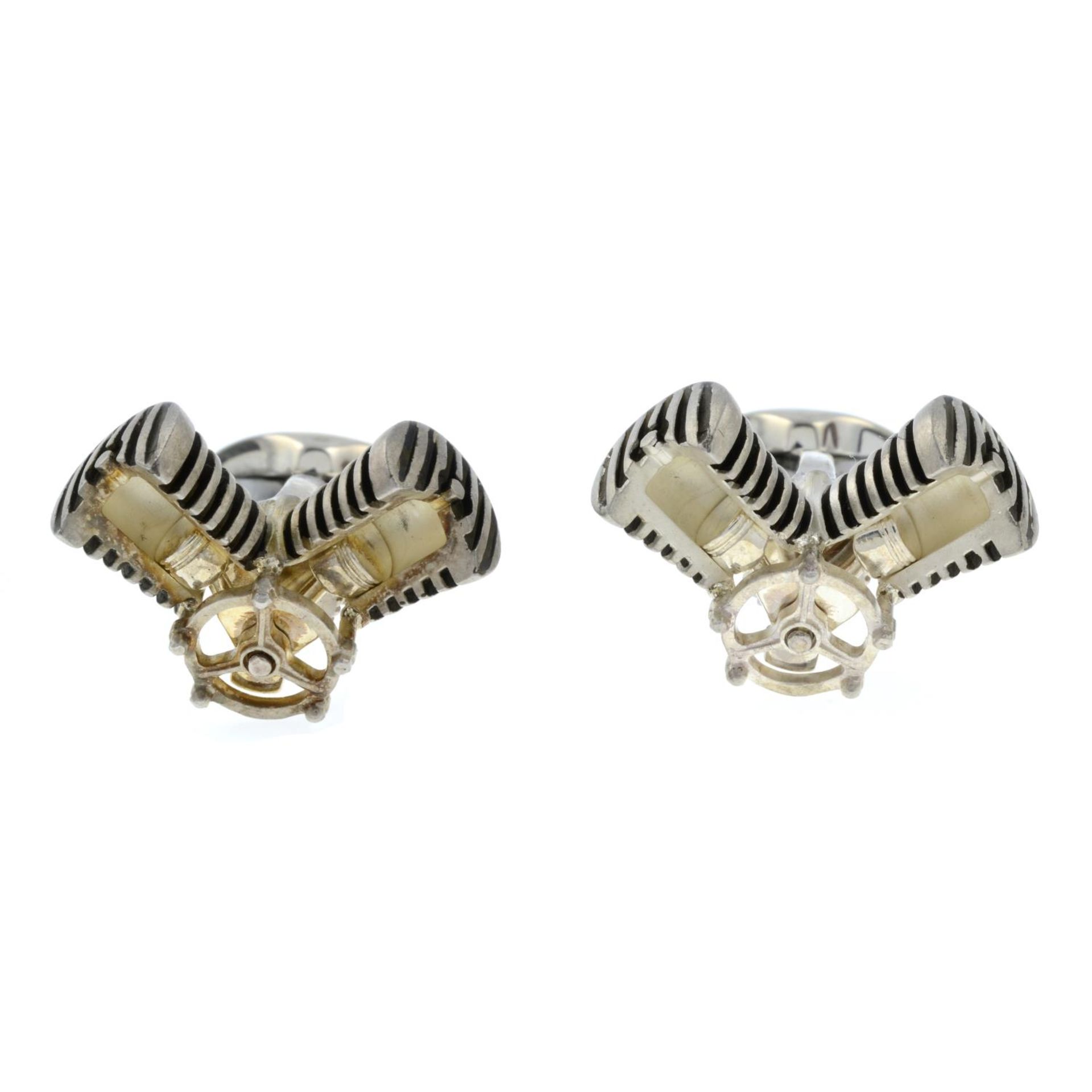 A pair of silver piston cufflinks, by Deakin and Francis.Signed D&F.