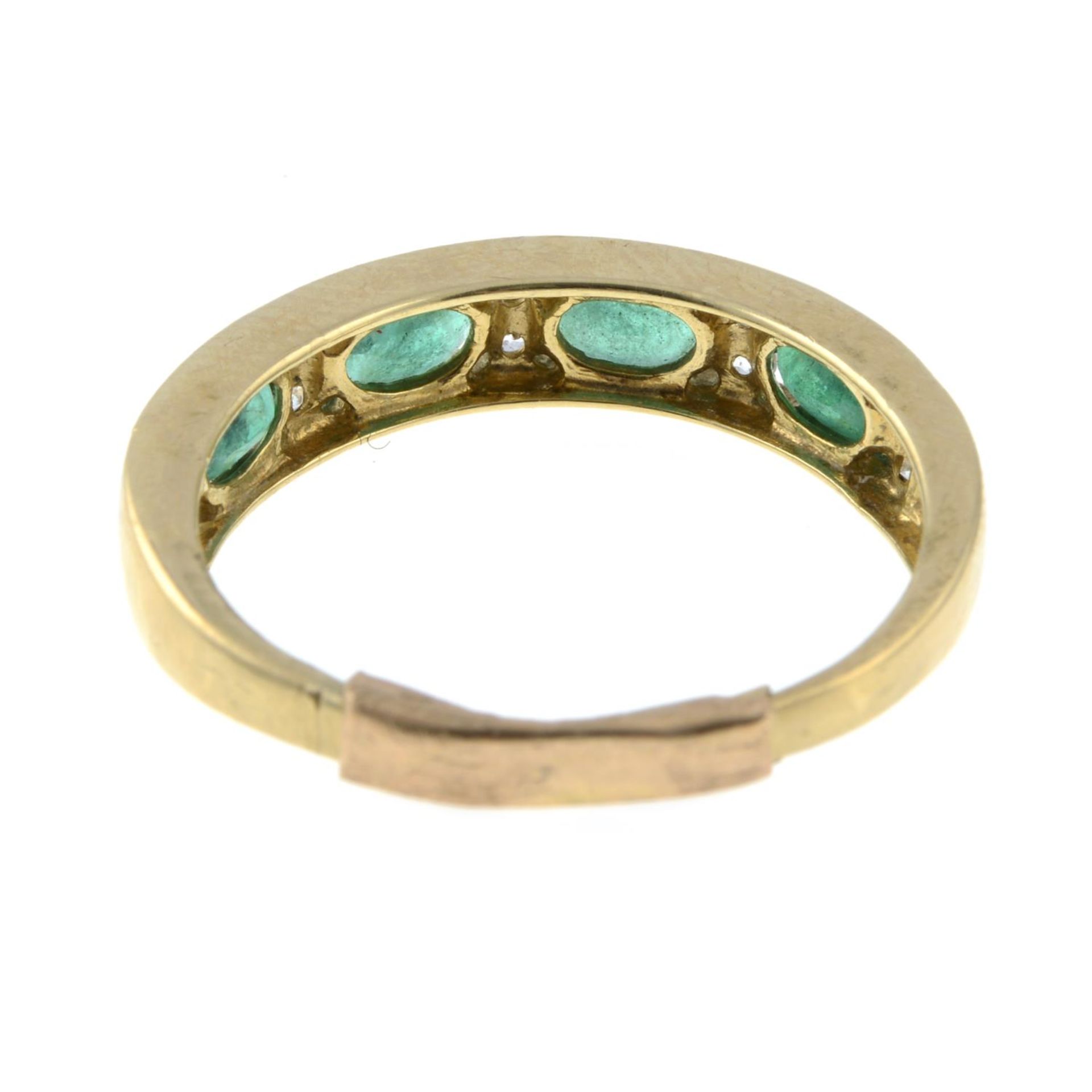 A 9ct gold emerald and colourless gem half eternity ring. - Image 3 of 3