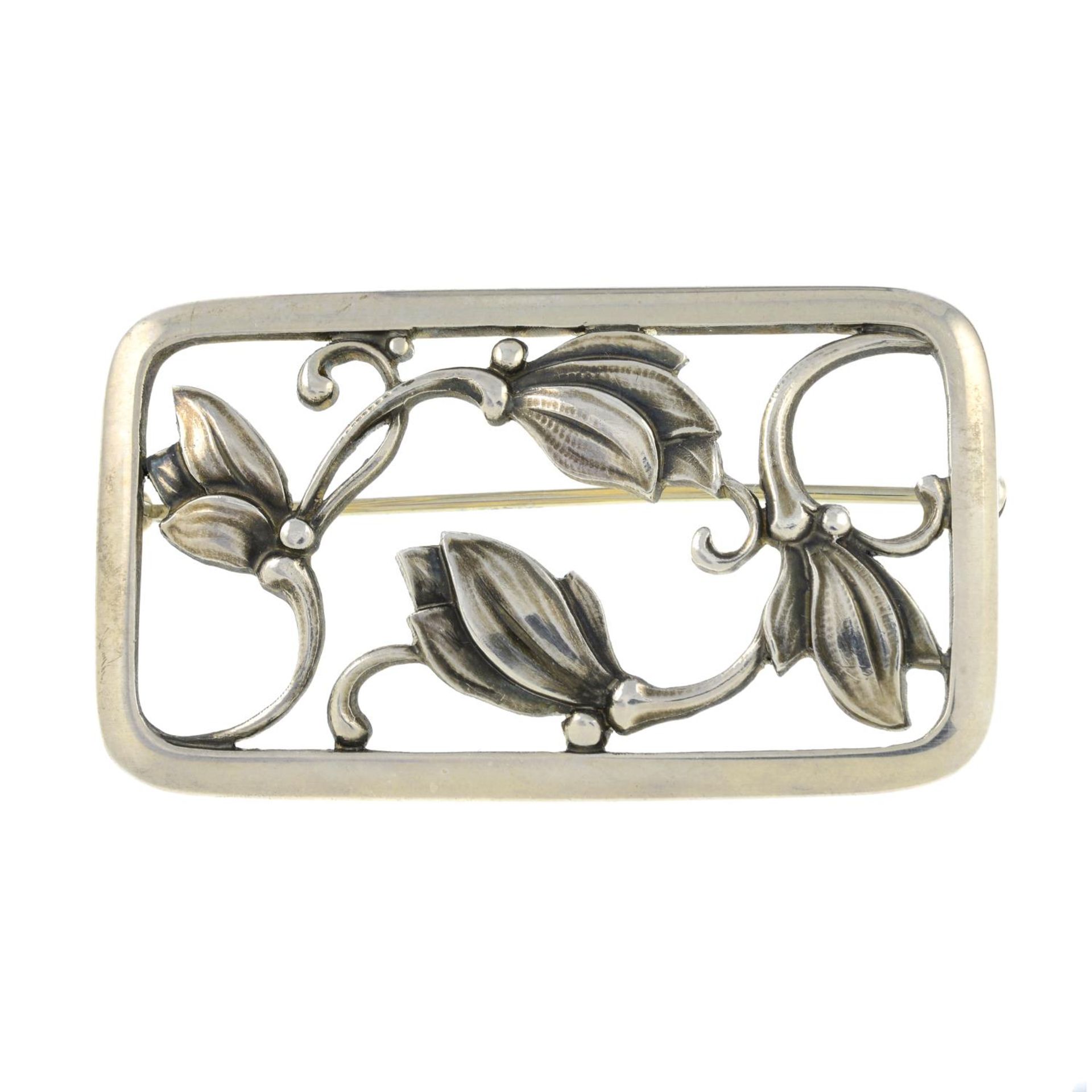 A silver floral brooch, by Georg Jensen.Import marks for silver.Length 5.4cms.